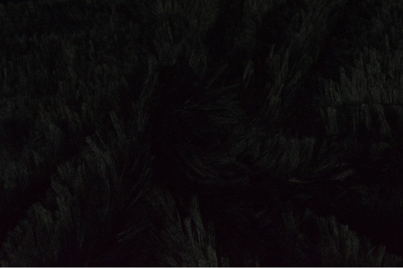 Langharig bont Zwart