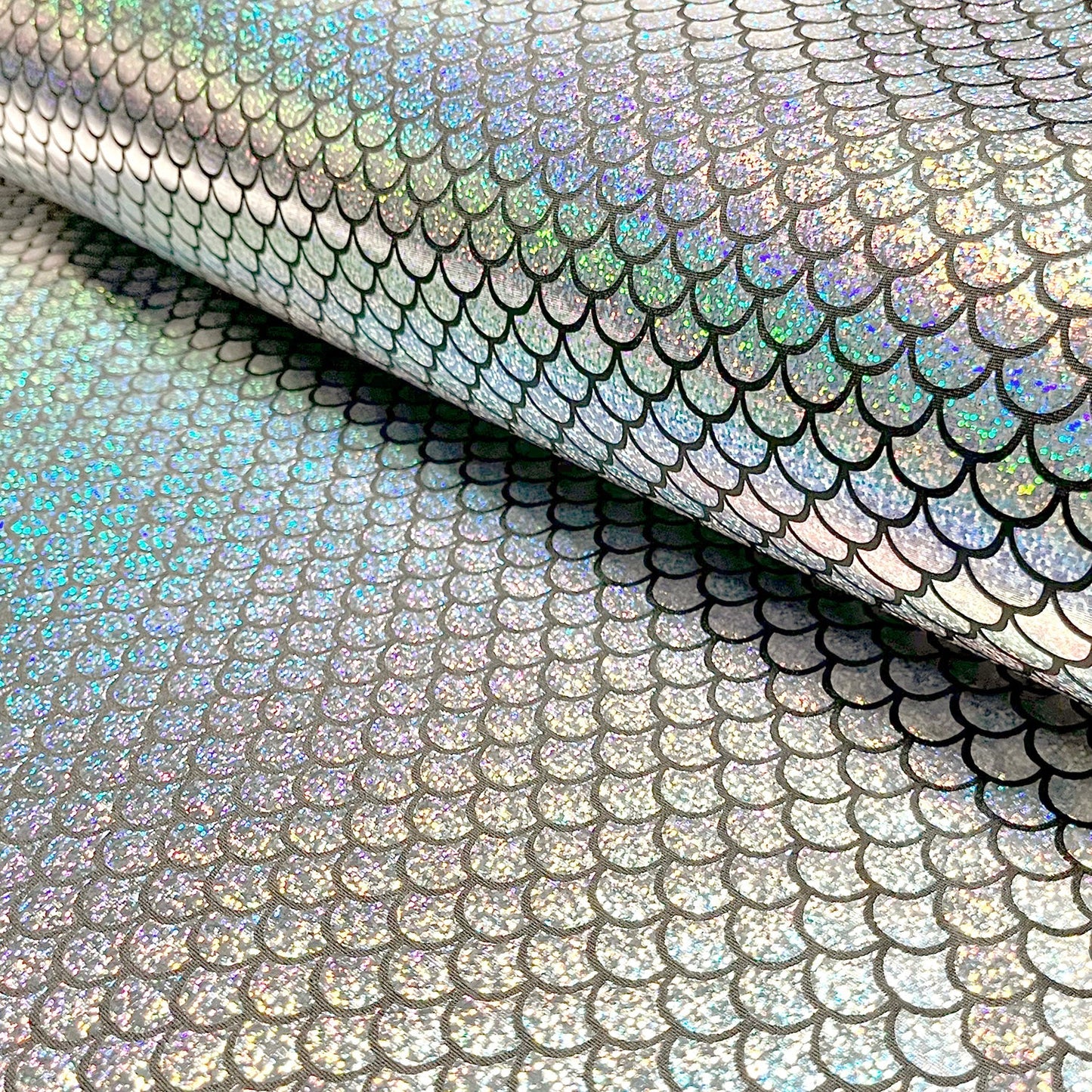Lamé-Stoff Foliendruck Meerjungfrau Silber