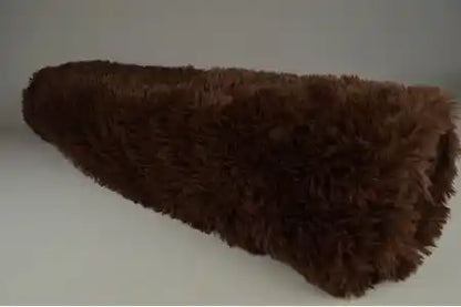 Langharig bont Bruin